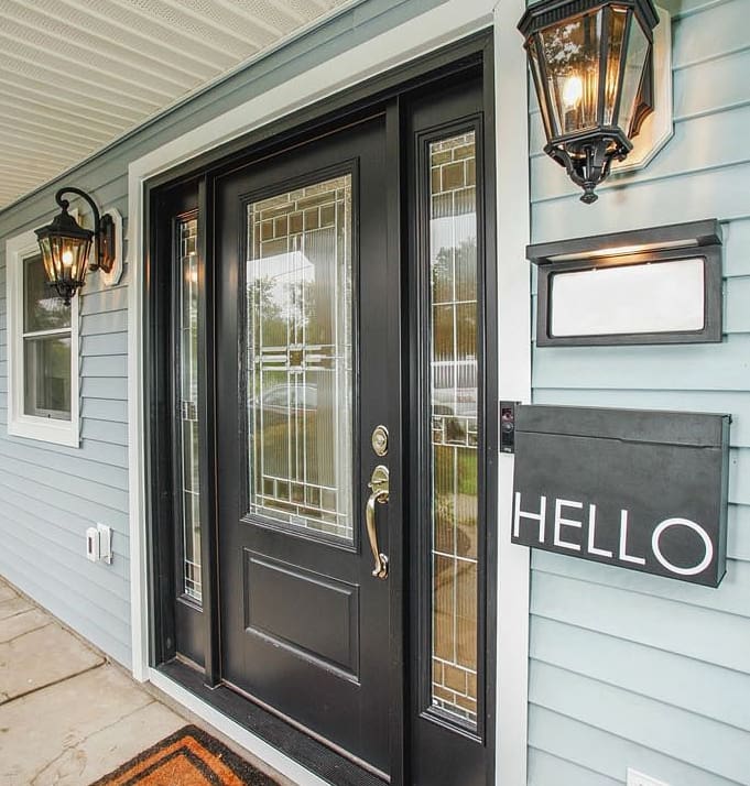 exterior door project on blue home by blue nail exteriors